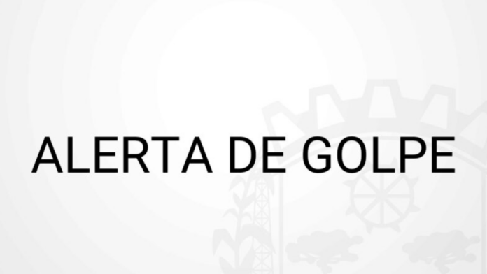 Banner branco com o texto 'Alerta de Golpe' no meio.